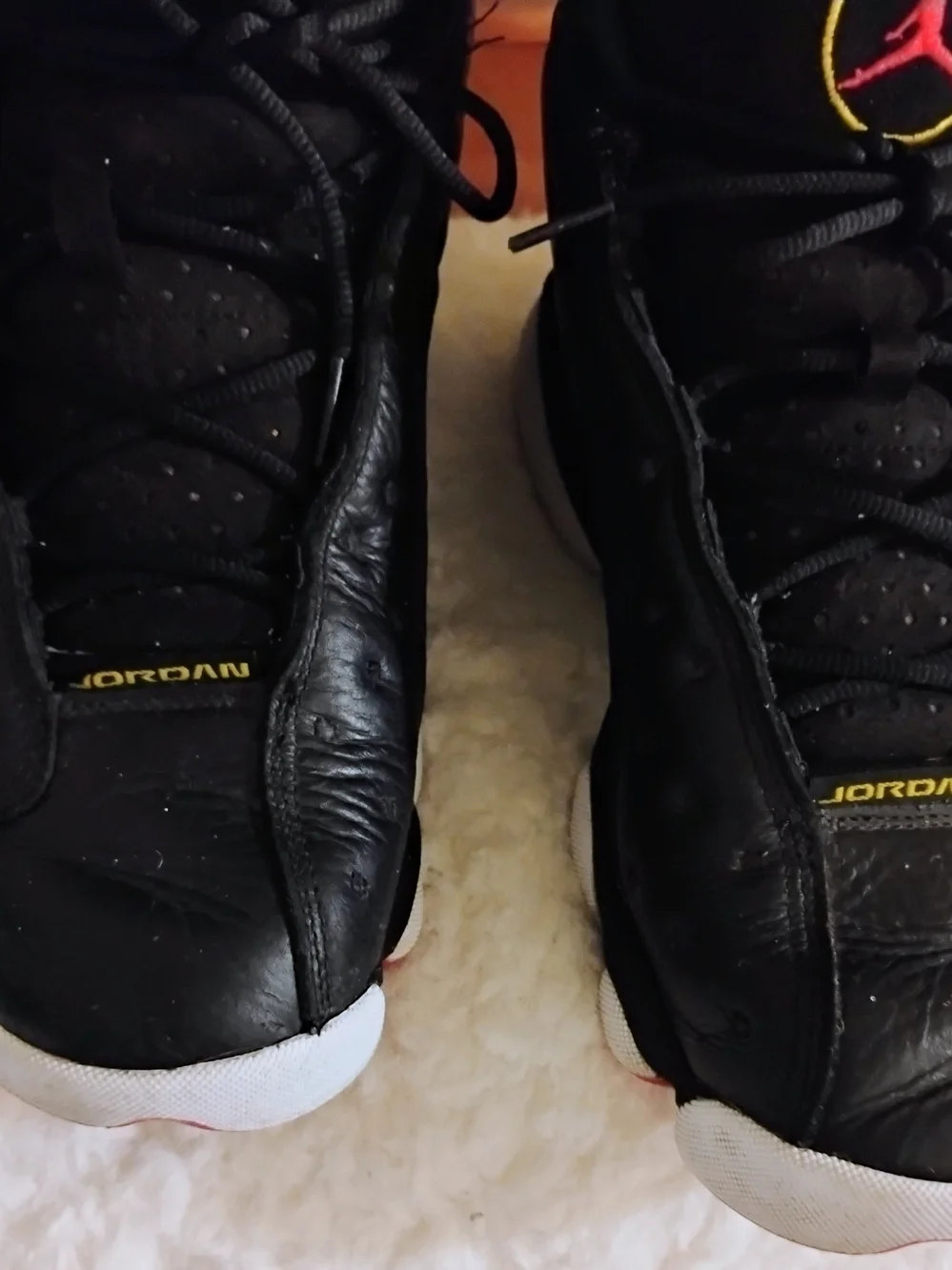 Jordan Black Sneakers with Red Jumpman and Yellow Trim